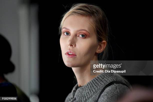 Model poses backstage for Marcel Ostertag during New York Fashion Week: The Shows at Gallery II at Spring Studios on February 14, 2018 in New York...