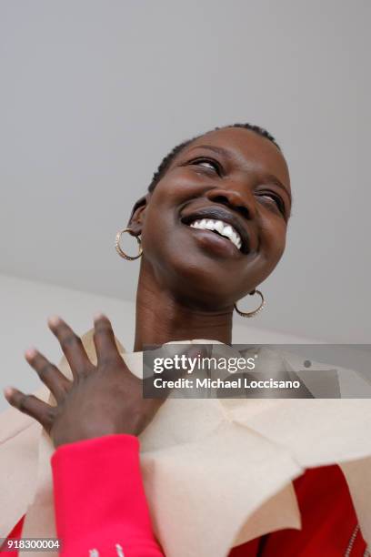 Model prepares backstage for Esteban Cortazar during New York Fashion Week: The Shows at Gallery I at Spring Studios on February 14, 2018 in New York...