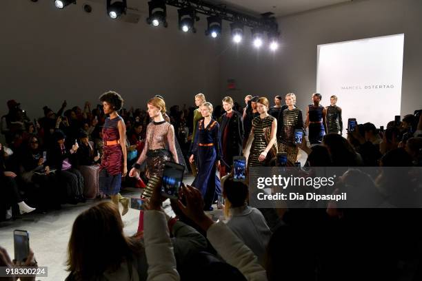 Models walk the runway for Marcel Ostertag front row during New York Fashion Week: The Shows at Gallery II at Spring Studios on February 14, 2018 in...