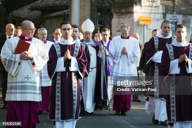 Pope Francis walks in procession to the Santa Sabina Basilica for the Ash Wednesday celebration on February 14, 2018 in Rome, Italy. Pope Francis...