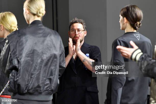 Designer Marcel Ostertag prepares the models backstage during Marcel Ostertag front row during New York Fashion Week: The Shows at Gallery II at...