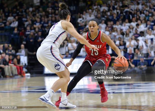 Louisville Cardinals Guard Asia Durr looks to drive to the basket as UConn Huskies Guard Kia Nurse defends during the game as the UConn Huskies host...