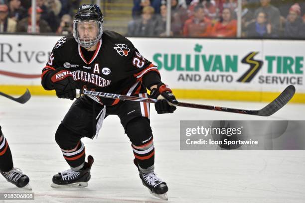 Northeastern Huskies defenseman Garrett Cecere waits for the puck to drop a face off. During the Northeastern Huskies game against the Boston...