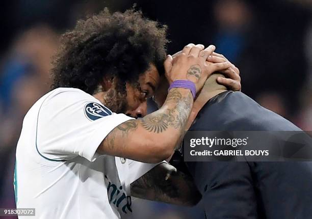 Real Madrid's Brazilian defender Marcelo celebrates a goal with Real Madrid's French coach Zinedine Zidane during the UEFA Champions League round of...