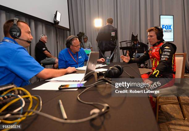 Jamie McMurray, driver of the McDonald's/Cessna Chevrolet, talks to the media during the Daytona 500 Media Day at Daytona International Speedway on...