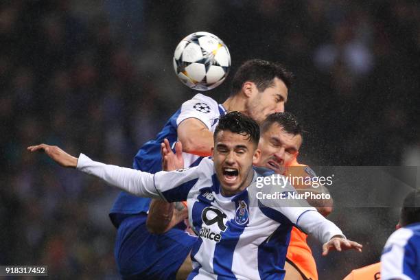 Porto's Mexican defender Diego Reyes vies with Porto's Spanish defender Ivan Marcano and Dejan Lovren defender of Liverpool during the UEFA Champions...