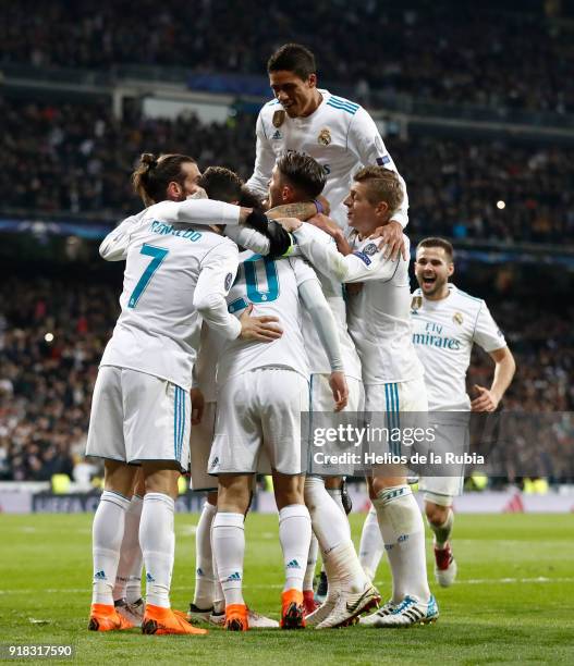 The players of Real Madrid celebrate after scoring during the UEFA Champions League Round of 16 First Leg match between Real Madrid and Paris...