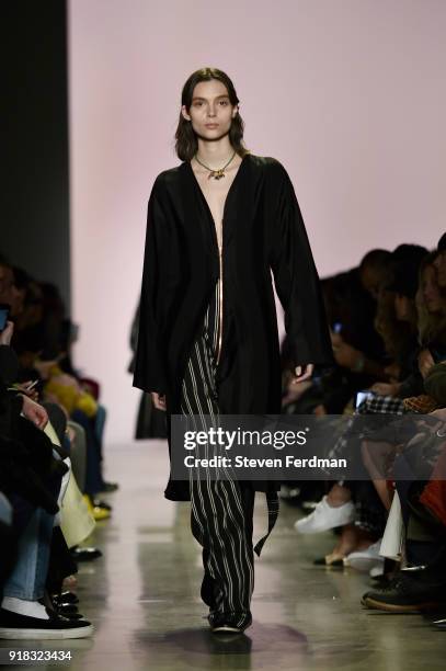 Model walks the runway during the Esteban Cortazar Fall 2018 Runway Show at Spring Studios on February 14, 2018 in New York City.