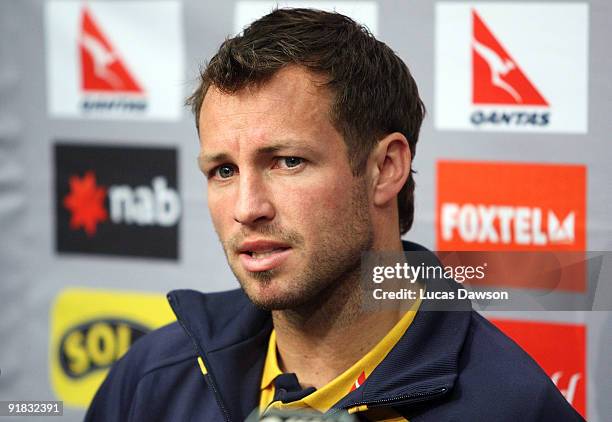 Australian Socceroos captain Lucas Neill talks to the media during an Australian Socceroos press conference at Etihad Stadium on October 13, 2009 in...