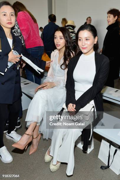 Actor Huang Yilin and Wen Yanxi attend the All Comes From Nothing x COOME FW18 show at Gallery II at Spring Studios on February 14, 2018 in New York...