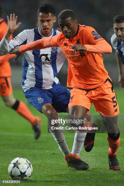 Porto defender Diego Reyes from Mexico vies with Liverpool midfielder Georgina Wijnaldum from Netherland for the ball possession during the UEFA...