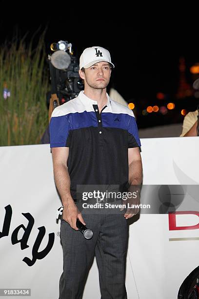 Singer Justin Timberlake looks at the course during his attempt to win a one million charitable donation to Shriners Hospitals for Children by...