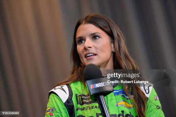 Danica Patrick, driver of the GoDaddy Chevrolet, talks to the media during the Daytona 500 Media Day at Daytona International Speedway on February...