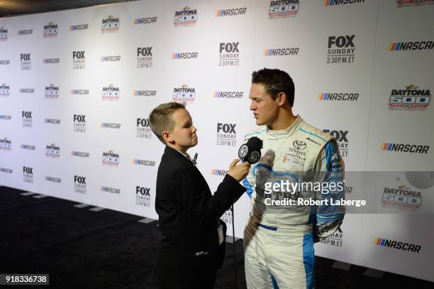 Gray Gaulding, driver of the Toyota, talks to the media during the Daytona 500 Media Day at Daytona International Speedway on February 14, 2018 in...