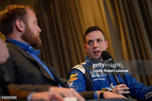 Alex Bowman, driver of the Nationwide Chevrolet, talks to the media during the Daytona 500 Media Day at Daytona International Speedway on February...