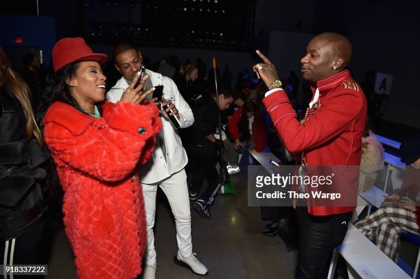 Stylist June Ambrose , recording artist Young Paris , and a guest attend the Laquan Smith front row during New York Fashion Week: The Shows at...
