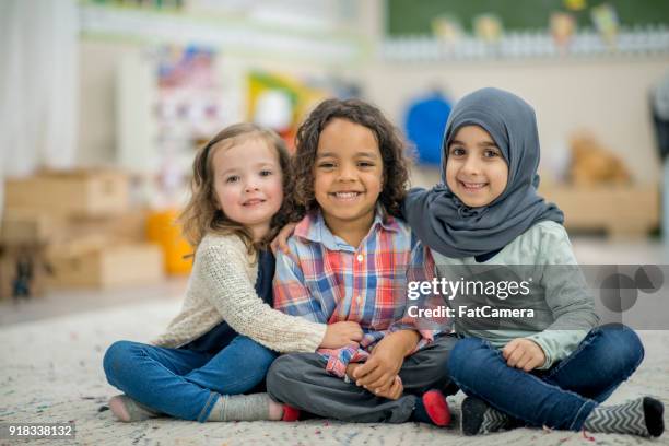 best friends - refugee stock pictures, royalty-free photos & images