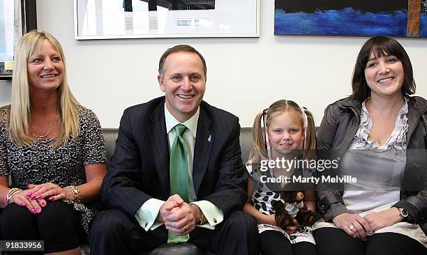 New Zealand Prime Minister John Key poses with 6 year-old Breanna Newman, her Mother Yvette Newman and Andrea Parker of Starship Hospital during an...