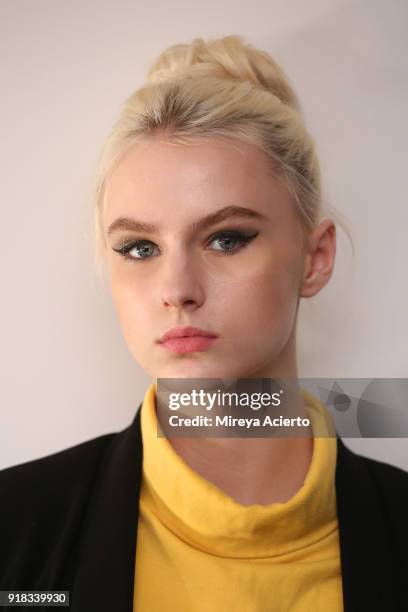 Model poses backstage for Irina Vitjaz during New York Fashion Week: The Shows at Gallery I at Spring Studios on February 14, 2018 in New York City.