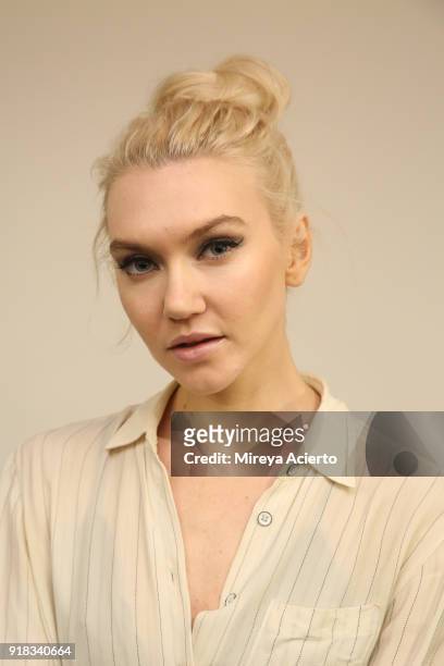 Model poses backstage for Irina Vitjaz during New York Fashion Week: The Shows at Gallery I at Spring Studios on February 14, 2018 in New York City.