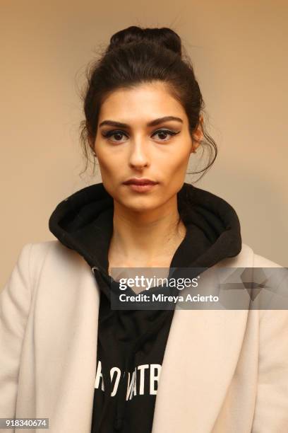 Model poses backstage for Irina Vitjaz during New York Fashion Week: The Shows at Gallery I at Spring Studios on February 14, 2018 in New York City.