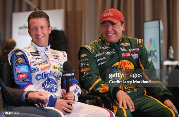 Allmendinger, driver of the Kroger ClickList Chevrolet, and Ryan Newman, driver of the Bass Pro Shops/Cabela's Chevrolet, talk to the media during...