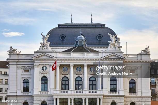 zurich opera house (upper half) with blue sky and clouds - opernhaus zürich stock-fotos und bilder