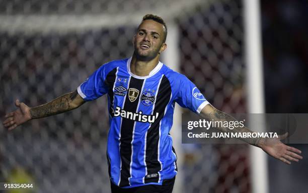 Brazil's Gremio forward Luan celebrates after scoring a goal against Argentina's Independiente during their Recopa Sudamericana 2018 first leg final...