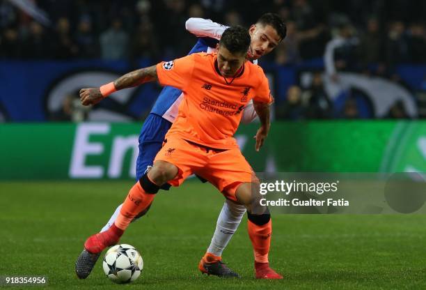 Liverpool forward Roberto Firmino from Brazil with FC Porto defender Diego Reyes from Mexico in action during the UEFA Champions League Round of 16 -...