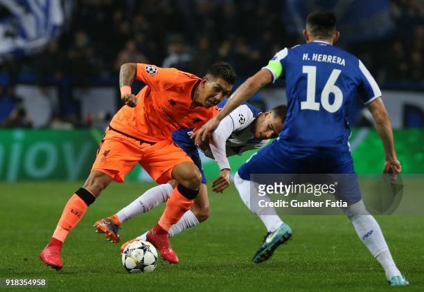Liverpool forward Roberto Firmino from Brazil with FC Porto defender Diego Reyes from Mexico in action during the UEFA Champions League Round of 16 -...