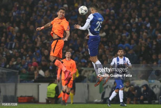 Porto defender Diego Reyes from Mexico with Liverpool forward Roberto Firmino from Brazil in action during the UEFA Champions League Round of 16 -...