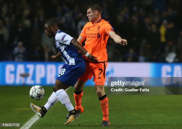 Porto forward Majeed Waris from Ghana with Liverpool midfielder James Milner from England in action during the UEFA Champions League Round of 16 -...