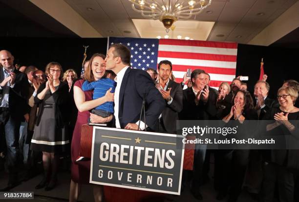 Eric Greitens kisses his wife, Sheena, before giving his victory speech after winning the Missouri governor's race on November 8 at his election...