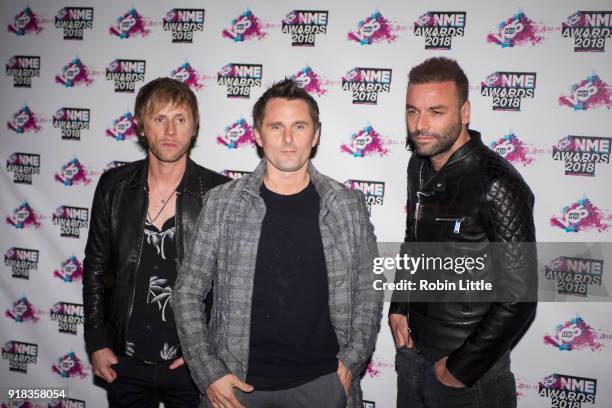 Dominic Howard, Matt Bellamy and Chris Wolstenholme of Muse attend the VO5 NME Awards held at Brixton Academy on February 14, 2018 in London, England.