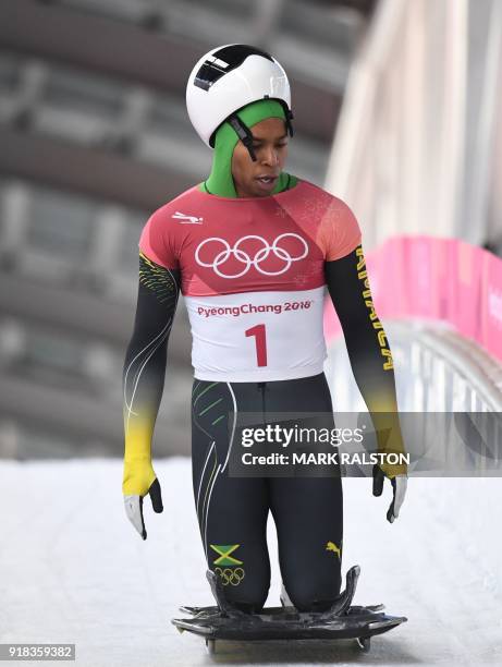 Jamaica's Anthony Watson looks on after finishing in the mens's skeleton heat 1 during the Pyeongchang 2018 Winter Olympic Games, at the Olympic...