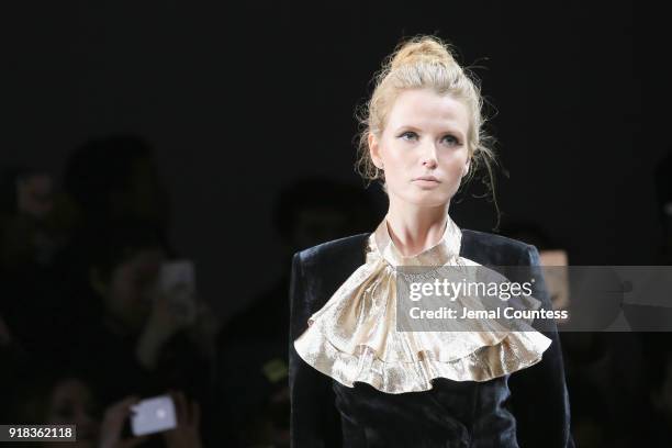 Model walks the runway during the Irina Vitjaz front row during New York Fashion Week: The Shows at Gallery I at Spring Studios on February 14, 2018...