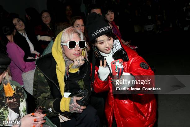 Chris Lavish and a guest attend the Irina Vitjaz front row during New York Fashion Week: The Shows at Gallery I at Spring Studios on February 14,...