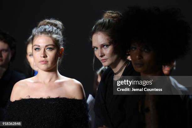 Models walk the runway during the Irina Vitjaz front row during New York Fashion Week: The Shows at Gallery I at Spring Studios on February 14, 2018...