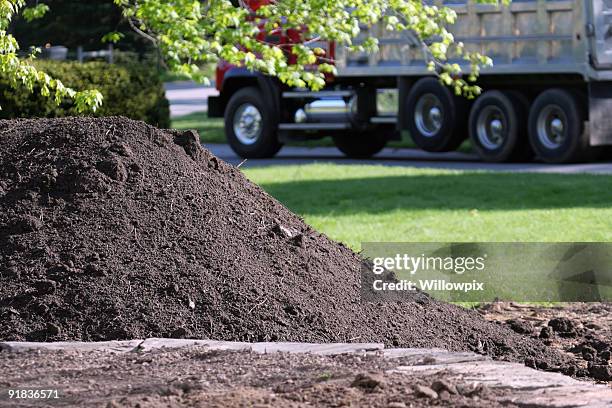 topsoil delivery dump truck for residential landscaping - pile of rocks stock pictures, royalty-free photos & images