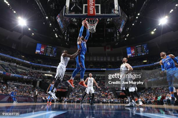 Steven Adams of the Oklahoma City Thunder dunks the ball against the Memphis Grizzlies on February 14, 2018 at FedExForum in Memphis, Tennessee. NOTE...