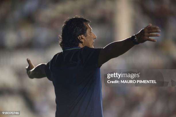 The coach of Bolivia's team Jorge Wilstermann, Roberto Mosquera, gestures during the Libertadores Cup football match against Brazil's Vasco da Gama...