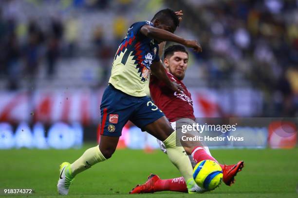 Diego Valdes of Morelia struggles for the ball with Darwin Quintero of America during the 7th round match between America and Monarcas as part of the...