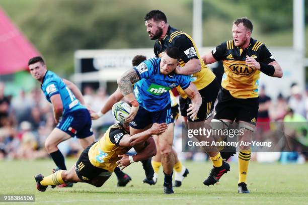 Sonny Bill Williams of the Blues offloads in a tackle during the Super Rugby trial match between the Blues and the Hurricanes at Mahurangi Rugby Club...