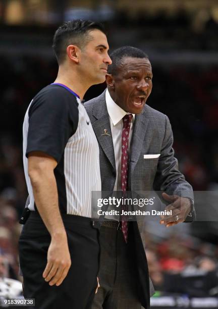 Head coach Dwane Casey argues with referee Zach Zarba during a game against the Chicago Bulls at the United Center on February 14, 2018 in Chicago,...