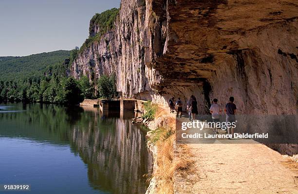 people hiking in bouzies, france - lot river stock pictures, royalty-free photos & images