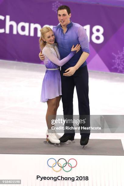 Gold medal winners Aljona Savchenko and Bruno Massot of Germany celebrate during the victory ceremony after the Pair Skating Free Skating at...