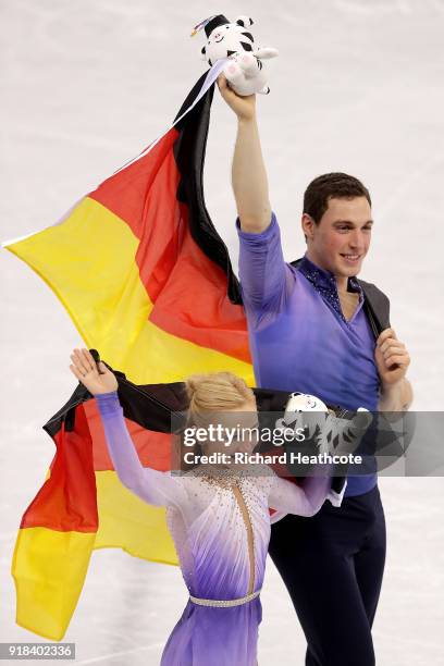 Gold medal winners Aljona Savchenko and Bruno Massot of Germany celebrate during the victory ceremony after the Pair Skating Free Skating at...