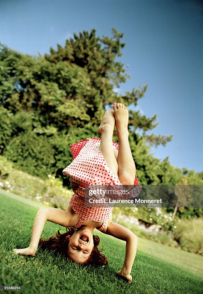 Girl doing headstand