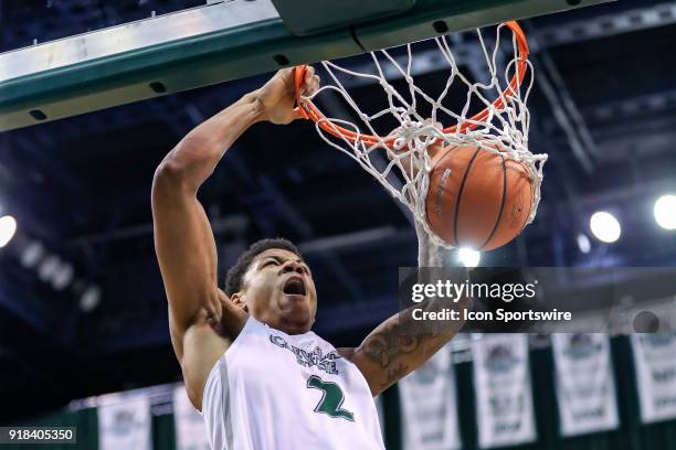 Cleveland State Vikings Anthony Wright scores with a dunk during the second half of the men's college basketball game between the Detroit Titans and...