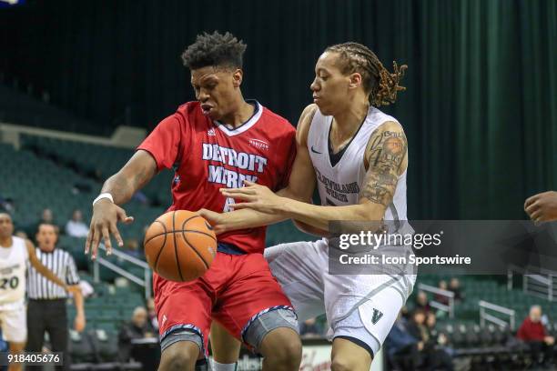 Detroit Titans guard/forward Kameron Chatman and Cleveland State Vikings Jamarcus Hairston battle for the basketball during the second half of the...